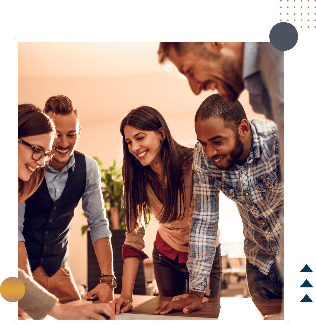 Diverse business team collaborating around a table in a modern office